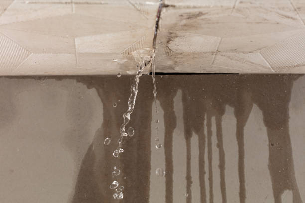 Professional Flood Damage Cleanup technician working in Sunset Beach, CA
